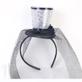 Close-up of silver sequin mini hat headband with black lace veil and floral accents - Silver with Veil