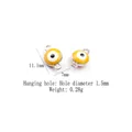 Macro detail of silver-rimmed yellow evil eye alloy charm with double loops for DIY jewelry - Silver - Yellow Evil Eye