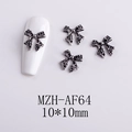 Detalle macro de adornos para manicura de lazo de aleación gris oscuro 10x10mm estilo retro - Lazo Texturizado Estéreo (AF64) / Plata Antigua