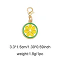 Lemon slice charm with yellow oil drip finish and golden lobster clasp, 3.3x1.5cm size - Lemon