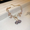 Detail of pink crystal beaded bracelet with floral charms and purple bellflower pendants - 14# Bracelet - Pink