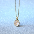 Golden hexagon necklace with white shell inlay featuring the letter J on a gold chain - Letter J