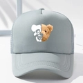 Detailed front view of grey trucker hat featuring unique teddy bear and skull print - One Size / Light Gray