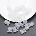 Macro shot of iridescent transparent white bear charms for DIY jewelry making and crafts - Frosted White AB
