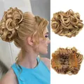Detail view of wavy golden brown synthetic hair bun showing inner comb clips and texture - 30T22 (Golden Copper Mix)