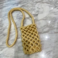 Handmade pale yellow macrame mobile phone bag with woven pattern and fringe details - Light Yellow