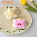 Lot de bandeaux en peluche cochon rose et étoile jaune sur un plat décoratif - Blanc Cassé - Paire de Bracelets