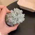 Light green fabric camellia flower hair claw clip with elegant beige lace details - Small Green Flower Claw Clip