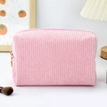 Pink corduroy large capacity travel makeup bag with gold zipper on white background - Octagonal Pouch / Pink