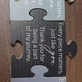 Wooden puzzle plaque gift with inspirational engraved message on brown wood table - 1-Every journey-Black