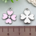 Pink enamel and silver clover pendants with rhinestones shown on a ruler for size - 1pc Pink Rhinestone Clover