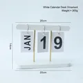 Minimalist white wooden flip calendar with gold metal rods and simple modern design - Minimalist White Flip Calendar
