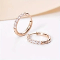 Sparkling rose gold huggie hoop earrings with round-cut cubic zirconia in a minimalist style - 8mm / Rose Gold
