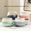 Set of four succulent ceramic pots in pastel gradient glazes with soft home decor lighting - 4 Piece Flowing Glaze Medium Ball Pots