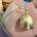 Mini golden brass bell pendant with green hanging cord for DIY crafts and wind chimes - 28mm Fruit Green Cord Alloy