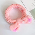 Pink coral fleece headband with large bow for face washing and makeup routines - Pink Strawberry Rabbit
