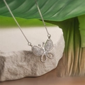 Elegant gold plated butterfly pendant necklace with cubic zirconia on white stone - Butterfly / Silver