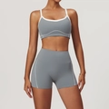 Greyish blue yoga set with sports bra and high-waisted shorts featuring white contrast piping - S / Bra + Shorts / Iron Grey