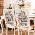 Pink and blue Christmas gnome chair covers with holiday tree patterns in a cozy living room - Leopard Hat Gnome (YT02-10)