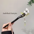 Classic Chinese hair stick featuring white flower buds, green leaves and pearl tassels - 104# Jade Color Flower Bud Hairpin