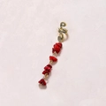 Detail of golden snake hair ring with red natural stone pendants on pink background - Wine Red Short E9106