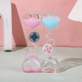 Dual heart liquid hourglass toy with pink and blue oil droplets and spinning wheels - SY01 Cream Windmill Blue Pink