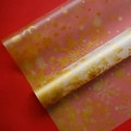 Translucent waterproof Christmas wrapping paper with gold snowflakes on red background - Nuosha Paper / Gold