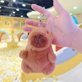 Plush brown capybara keychain accessory with soft texture and silver lobster clasp - Dark Brown Basic + Silver Clip