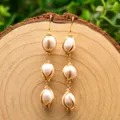 Elegant 925 silver drop earrings with triple natural freshwater pearls in gold wire wrap - 3-Strand Wire Wrapped Earrings