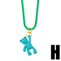 Detail view of a sky blue teddy bear pendant on a green chain with dopamine style - Grass Green + Light Blue