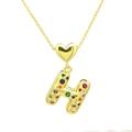 Detail of gold necklace featuring a polished heart and multicolor zircon letter H pendant - Letter-H