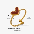 Verstelbare gouden roestvrijstalen ring met een getextureerd rood hart detail - Open Hart Ring / Rood (Gouden Ring)