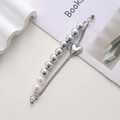 Zilveren kralenarmband met hartvormige hanger en magneetsluiting op lichte achtergrond - K670 Hart Armband