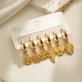 Macro detail of six gold stainless steel earrings with charms on a display card - Animal Plant Mixed Style (44008)