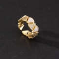 Detail of adjustable gold ring featuring geometric triangle patterns with white zircon stones - Triangle Geometry White Enamel