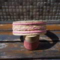 Detailed view of woven raffia headband with pink diamond pattern and natural texture - Pink and Beige Patchwork Wide Edge