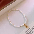 Bohemian style beaded bracelet featuring white seed beads and a golden cowrie shell charm - 6# Bracelet - White - Shell