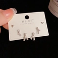 Three-piece silver earrings set featuring small heart studs and sparkling bow designs - Silver-Crossed Heart Set (118#)
