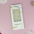 Golden striped birthday candles in elegant white and gold box on pink background - Wave Box White Pencil Candle