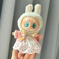 Pink cardigan and white lace dress with green bunny ears for Labubu doll figure - White Dress With Colorful Buttons / First And Second Generation Keychains Are Compatible With La Cloth Dolls. Dolls Not Included.
