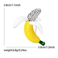 Cute banana enamel brooch pin with yellow crystals and green stem for accessories - White