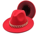 Detail of red fedora hat featuring bold gold acrylic chain link and wool felt texture - Red+Wine Red