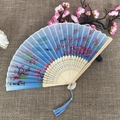 Bamboo folding fan with blue gradient peach blossom landscape and blue tassel detail - No.49 Blue Gradient Peach Landscape