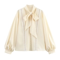 Elegant beige long sleeve blouse with lace stitching, tie-neck bow and pearl buttons - S / Milky White
