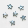 Detailed view of six blue-grey starfish glass beads for DIY jewelry making - Pack of 30 / Plated Ink Blue