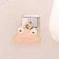 Macro shot of silver modular charm link featuring a pink and gold enamel frog pendant - 0189-fat Frog Pink-phnom Penh