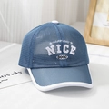 Detail view of blue breathable mesh sun hat for kids featuring white letter embroidery - 52cm (3-6 Years) / Blue