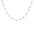 Detail shot of a minimalist gold chain necklace with delicate blue bead accents on white background - Necklace / Blue