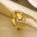 Close-up of gold-plated geometric ring with pavé zircons on beige velvet jewelry box - Adjustable Open / 14046/Gold Geometric Link Style
