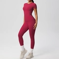 Detail of dark red yoga set showing high-waisted leggings and slim fit t-shirt texture - S / Carmine